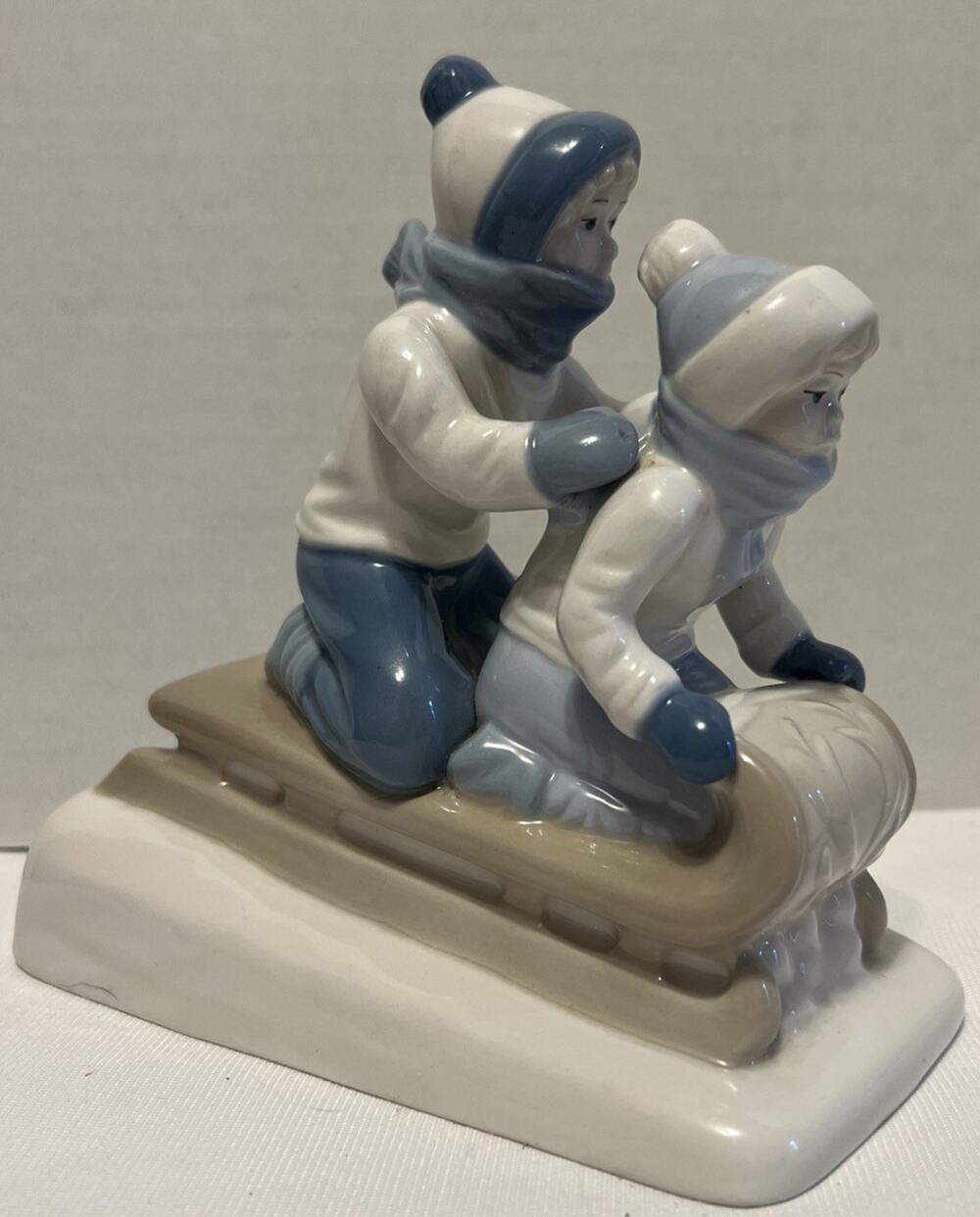 Vintage Paul Sebastian Fine Porcelain Children on Sled Figurine 1992, 6”x6”